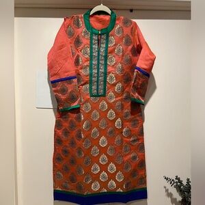 Indian heavy kurti with silk details and rhinestone work